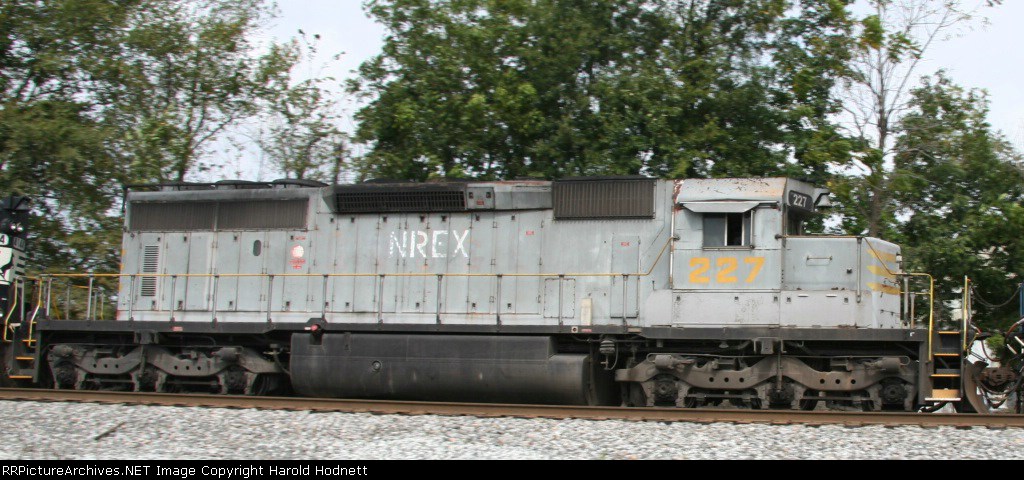NREX 227 heads northbound on a NS train